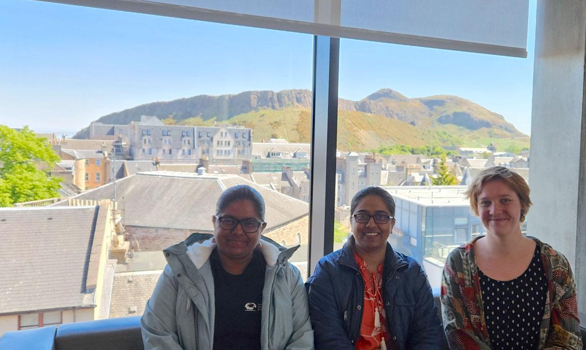 Image: (Left to Right) SSI Fellows: Saranjeet Kaur, Jyoti Bhogal, Samantha Wittke at EPCC, Bayes Center, University of Edinburgh against the backdrop of the Holyrood Park (Salisbury Crags on the left, Arthur’s Seat on the right). 