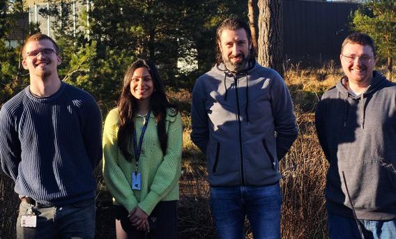 Photograph shows 4 ACF interns and Graduate Apprentices outside the ACF